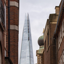 A view of the Shard between Victorian terraced houses.