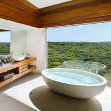 A bath with a view of the countryside at the Southern Ocean Lodge Kangaroo Island.