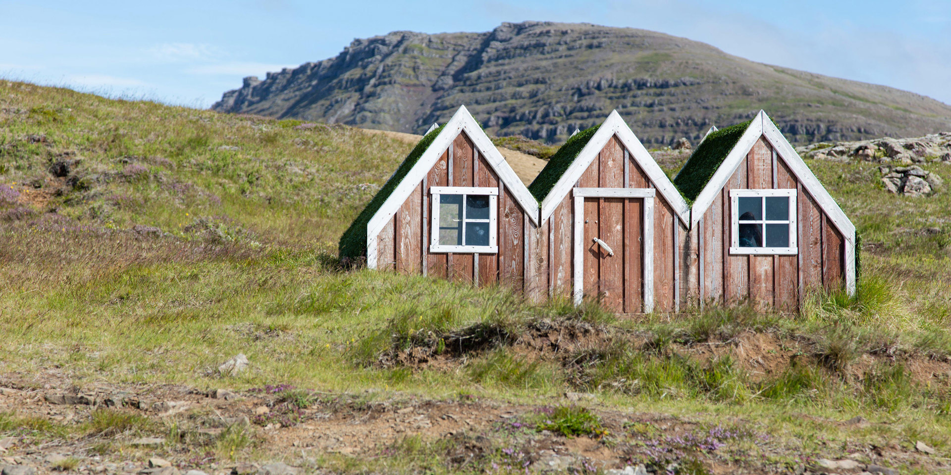 Small wooden house in the Icelandic countryside.