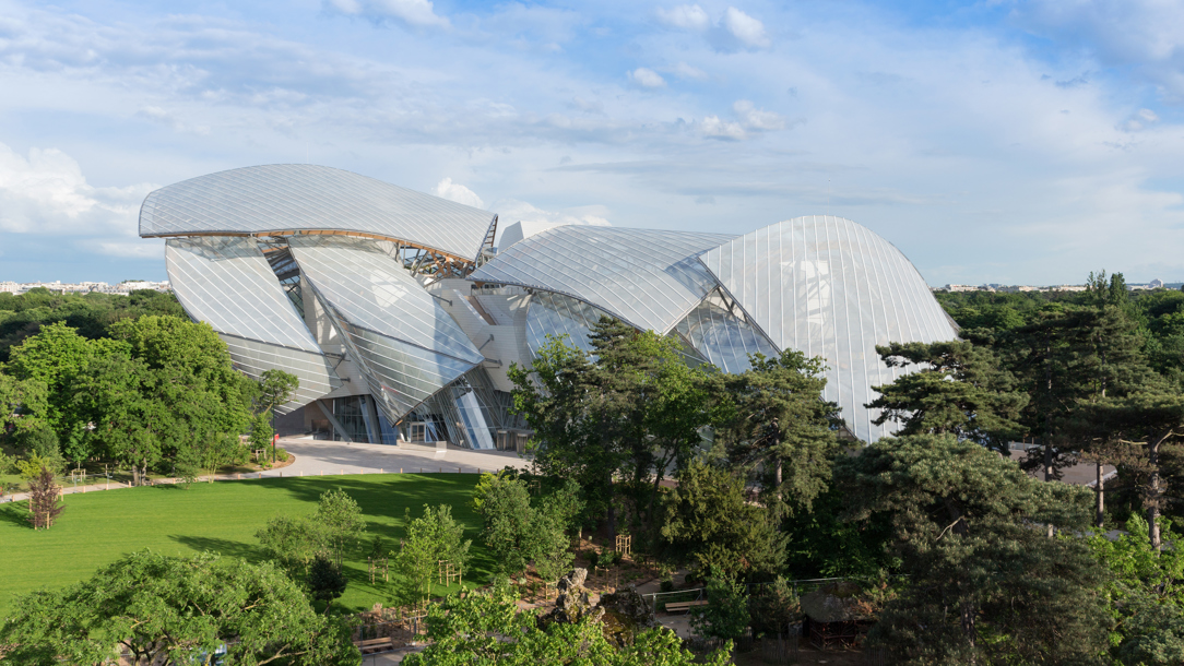 A wide view of the modern architecture of Fondation Louis Vuitton.