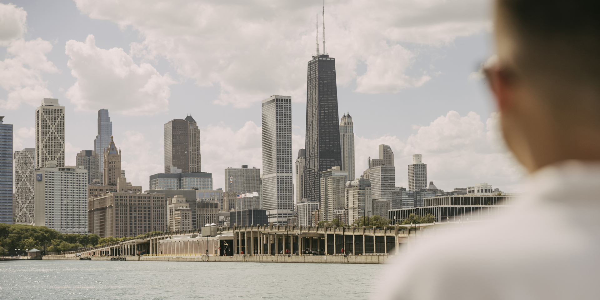 A man looking at the skyline of Chicago.