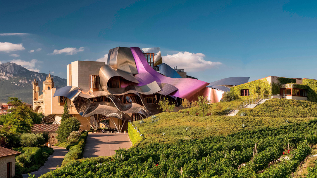The futuristic Hotel Marques De Riscal amongst vineyards.