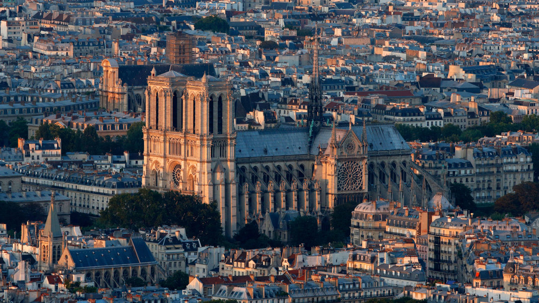 A wide angle view of Notre Dame in Paris.