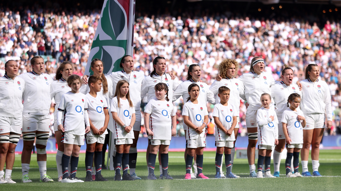 The Women's England Rugby Team lined up ready to play.