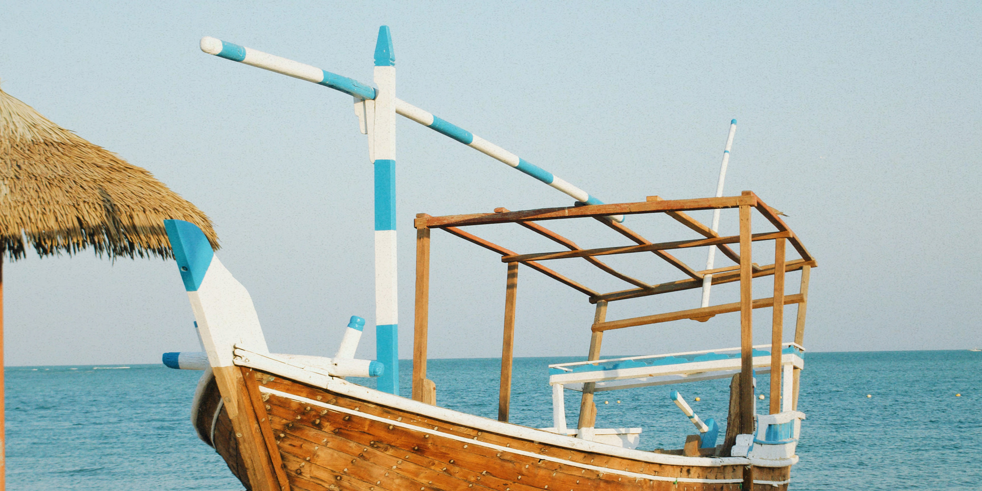 A boat on a beach in Doha Qatar.