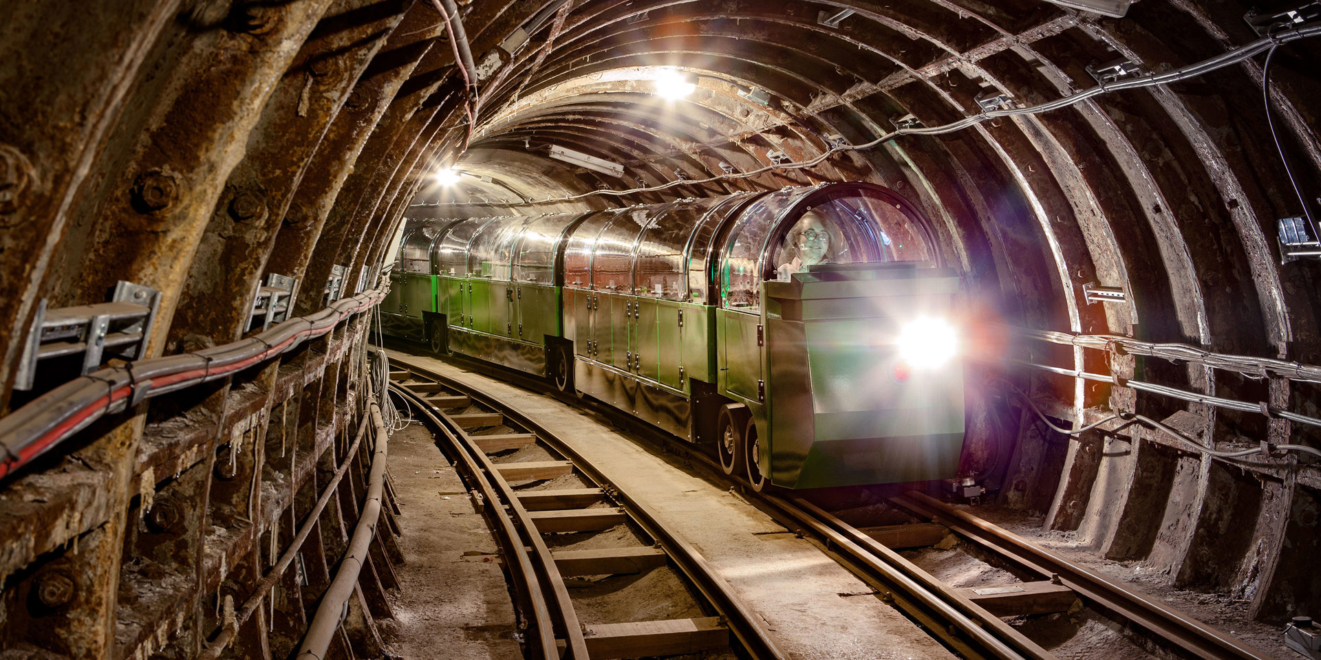 An underground train coming towards the camera.