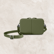 A moss coloured "Carry Me" bag from July.