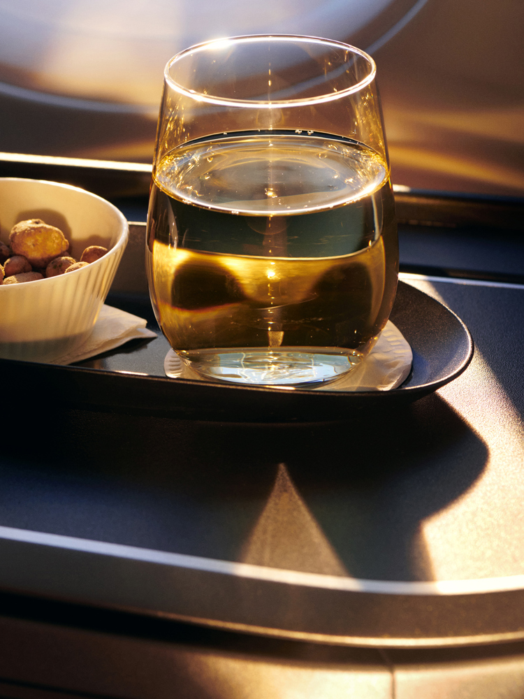 Drinks and a snack onboard a British Airways plane.