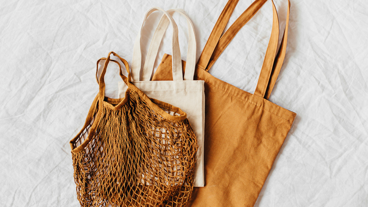 A still life photograph of tote bags.