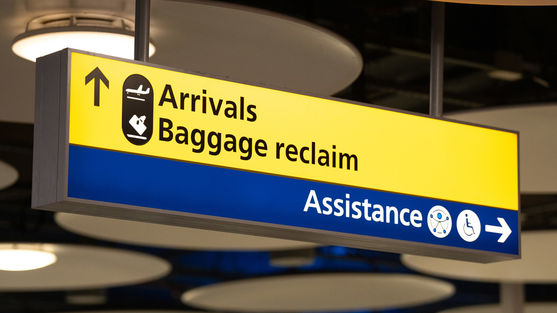 Signage for baggage arrival at Heathrow airport.