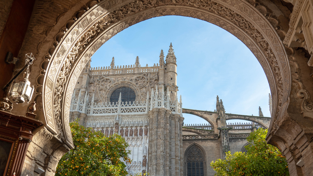 Architecture in Seville viewed through an arch.