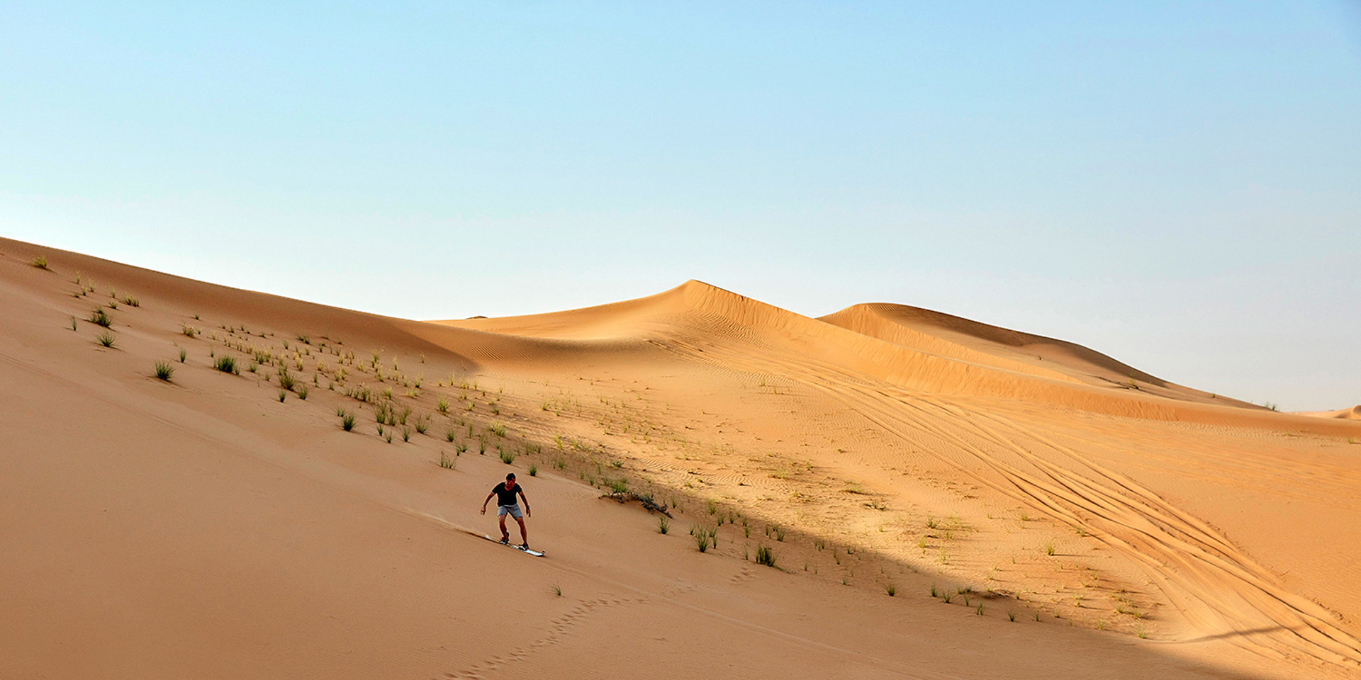 Sandboarding in Dubai.