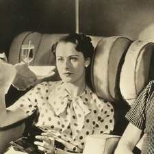 An archive photography of passengers on board an Imperial Airways plane.