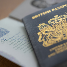 Two British passports on a table.