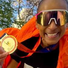 Contributor Adele Roberts with one of her many marathon medals