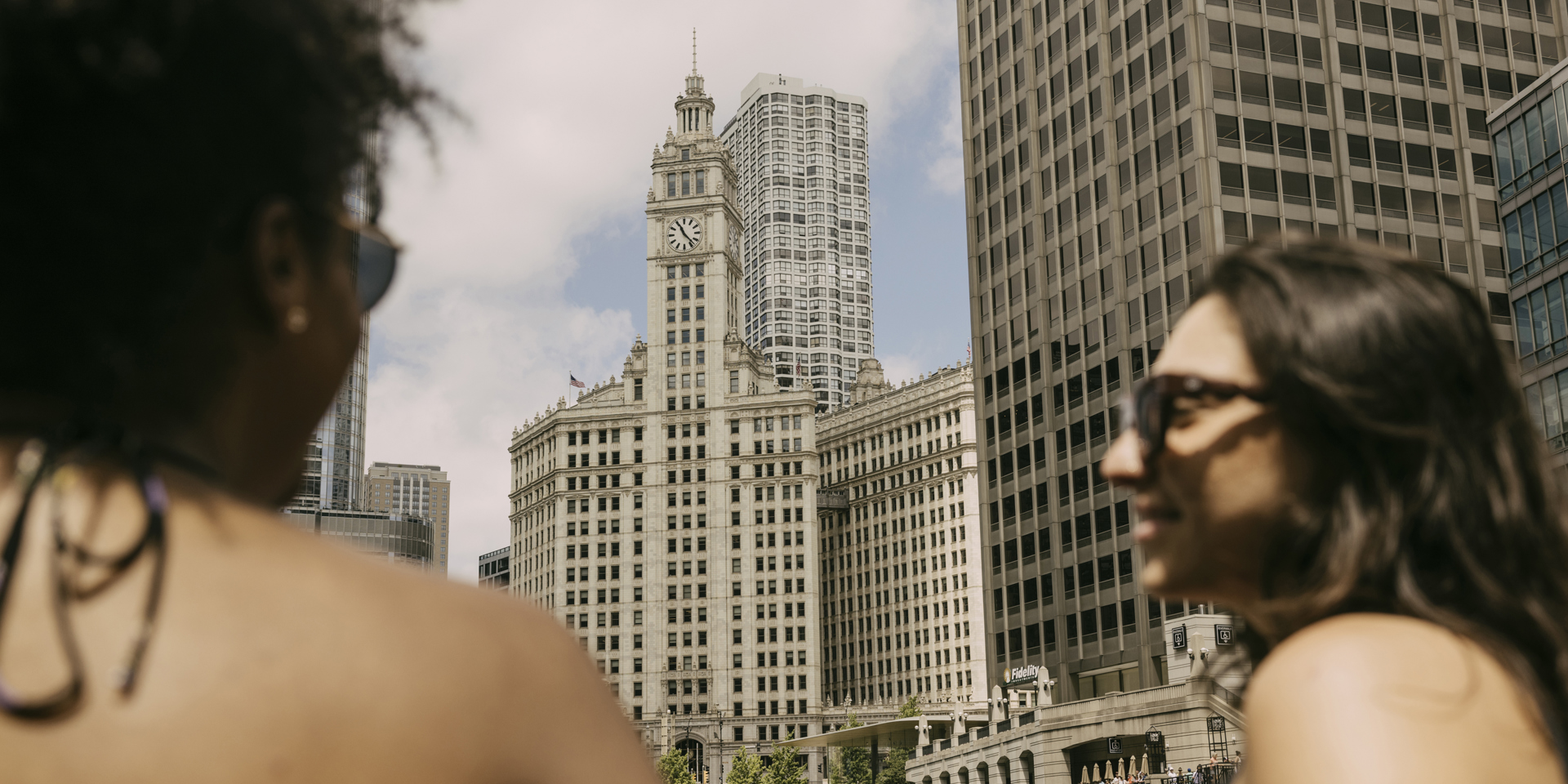 Two women on the street in Chicago on a summer day.