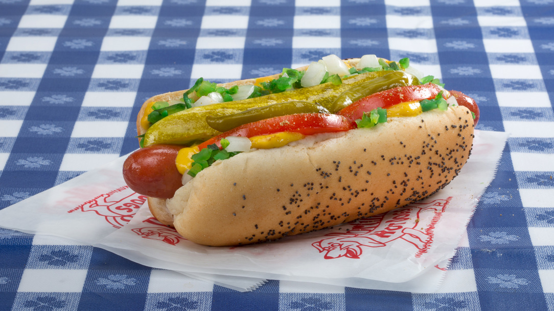 A hot dog on a napkin.