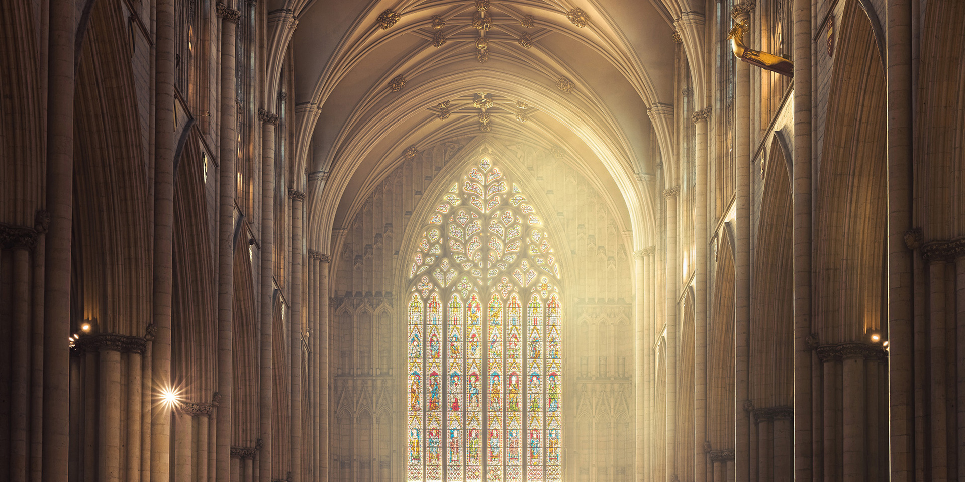 York Minster's Great West Window bathed in ethereal light.