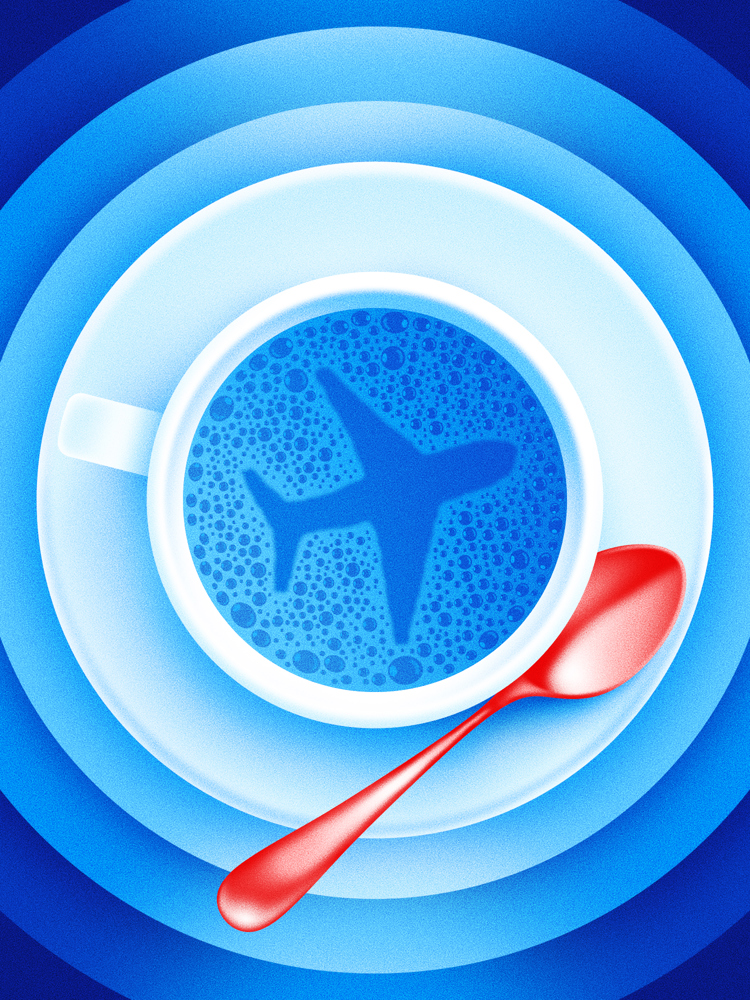 An overhead view of a cup with a plane inside and a red spoon.