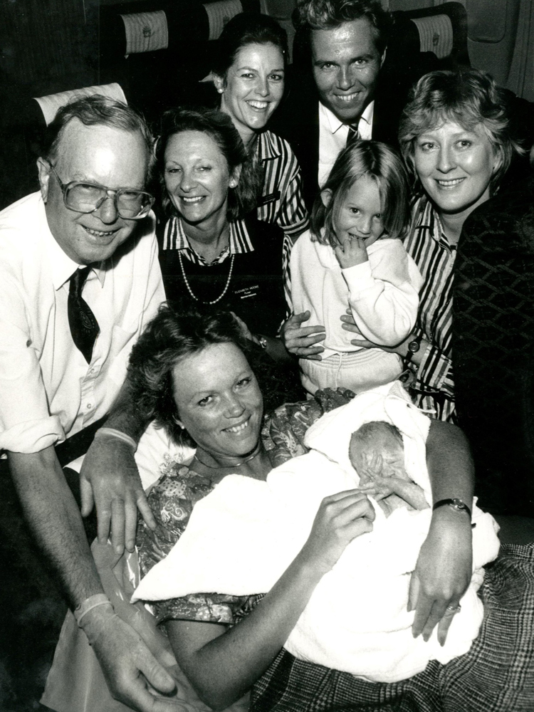 Shona Owen in her mother's arm just after her birth.