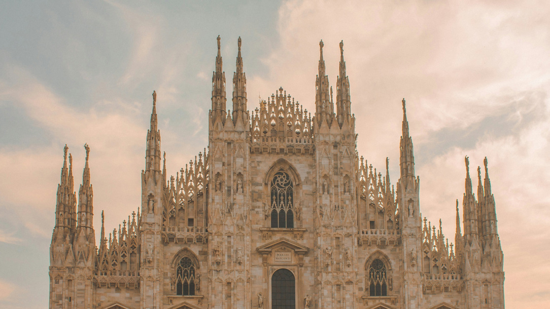The grand facade of the cathedral in Milan.