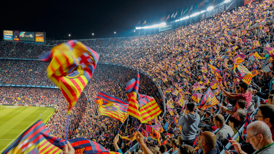 Football fans watching a match.