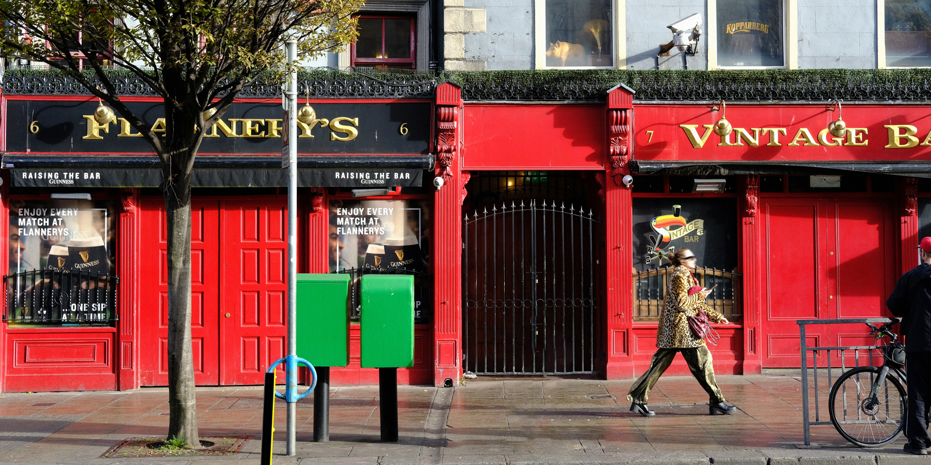 A street scene with a bright red building in Dublin's Portobello area.