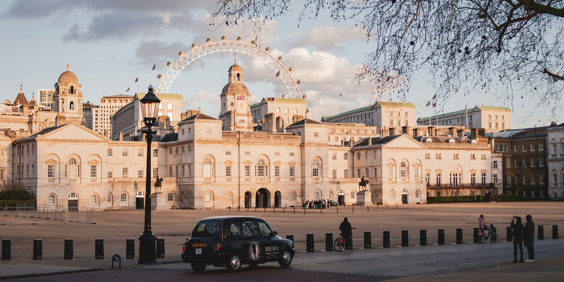 Horse Guards building with a cab driving past.